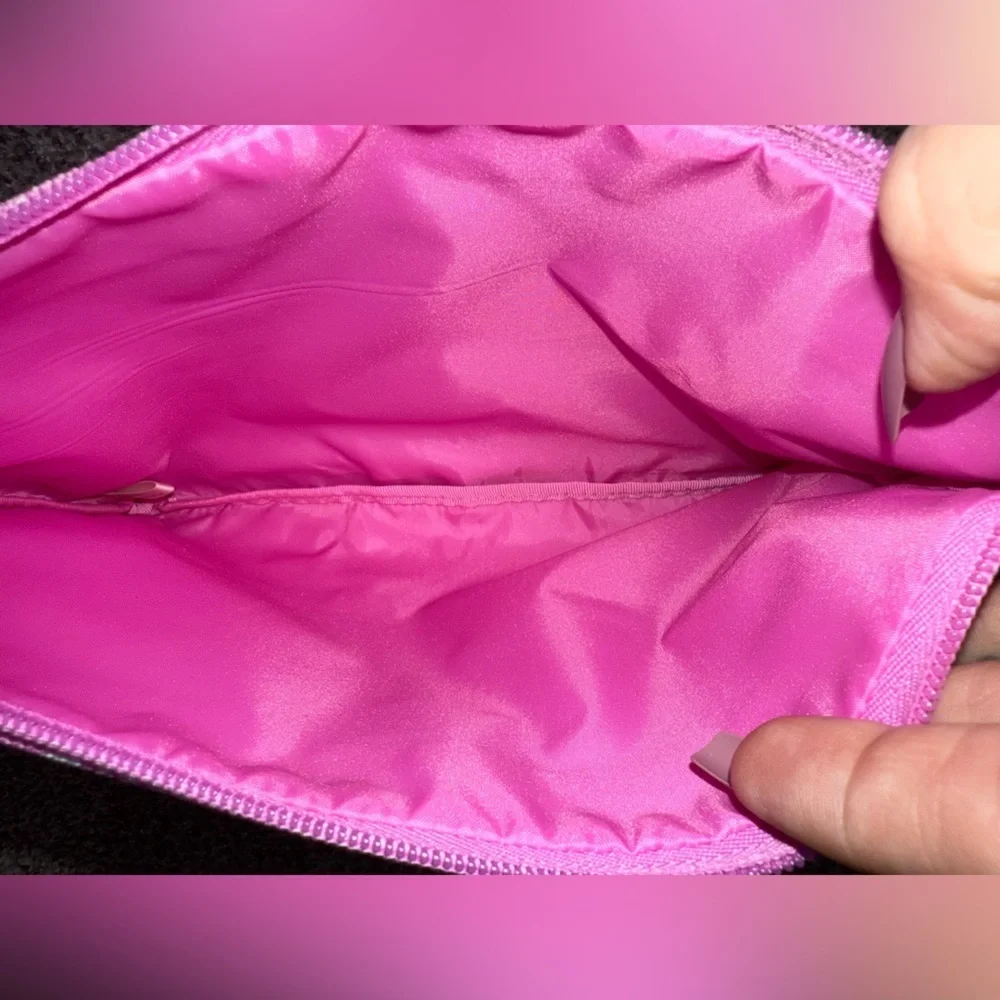 Pink - pink wristlet with pink logo